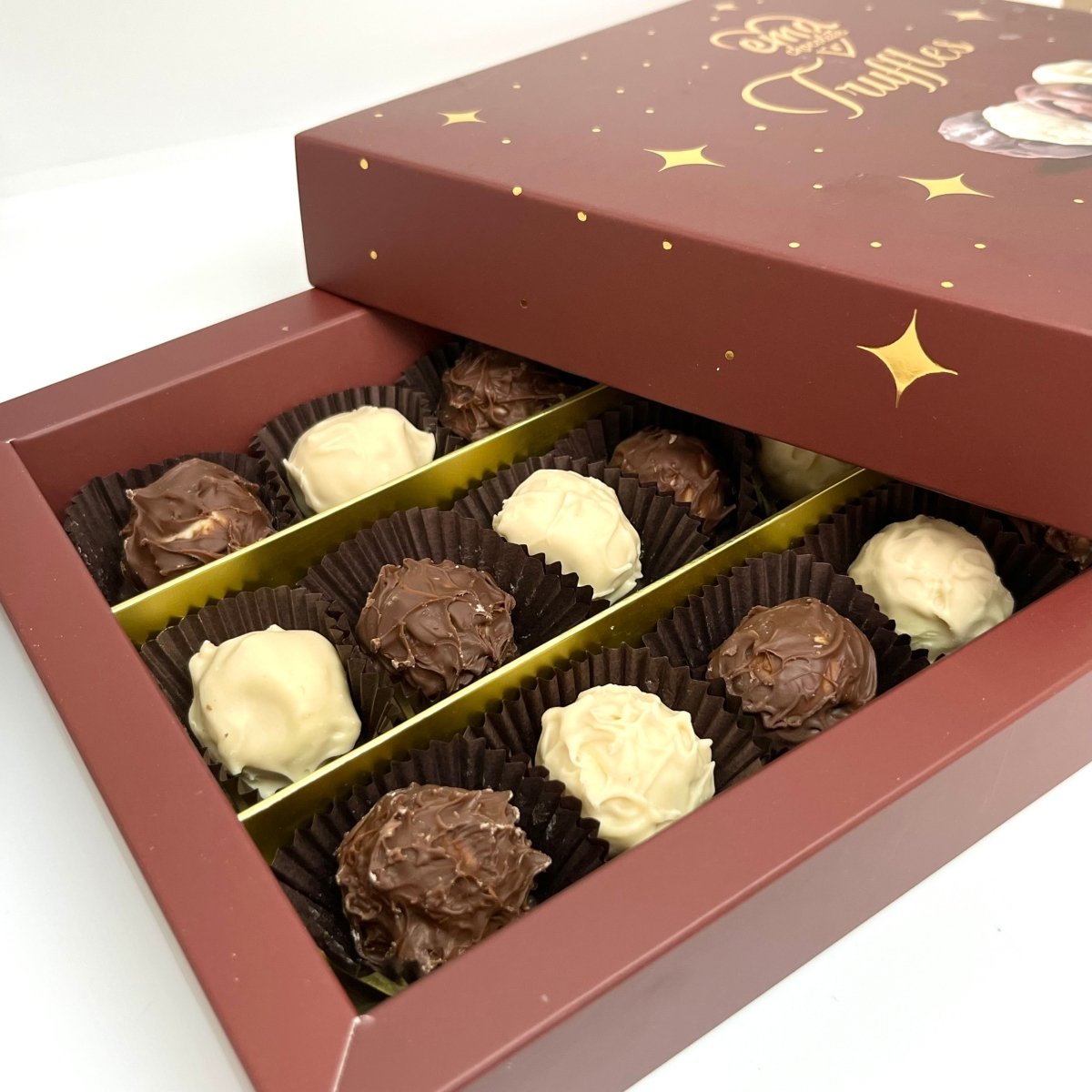 Ema Chocolate Milk and White Chocolate Truffles With Hazelnut Cream - 250g - TryAladdin